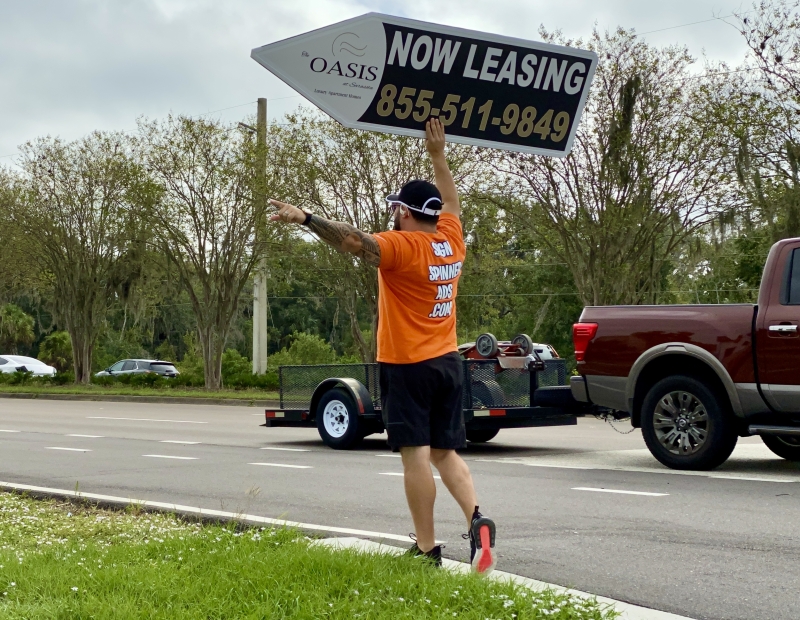 Sign spinner in action