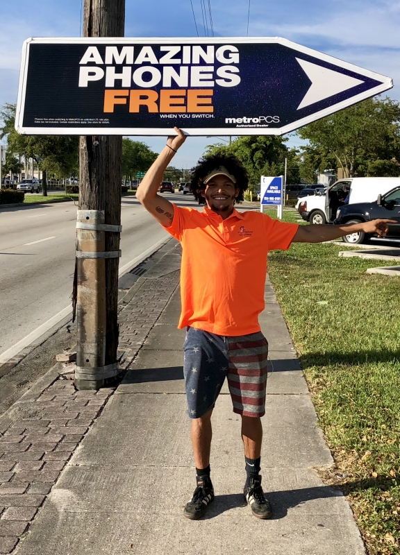 Sign spinner in action