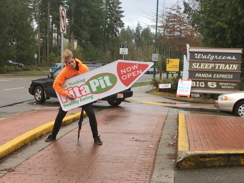 Sign spinner in action
