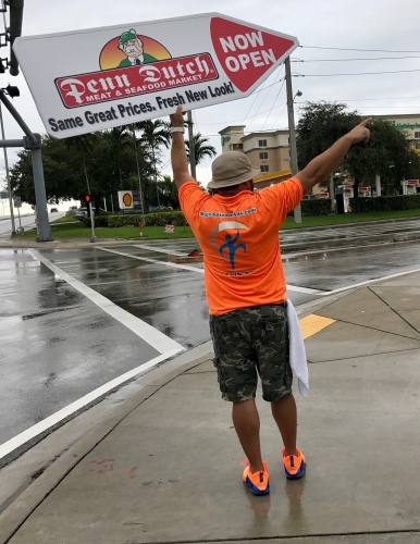 Sign spinner in action