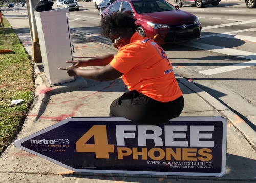 Sign spinner in action