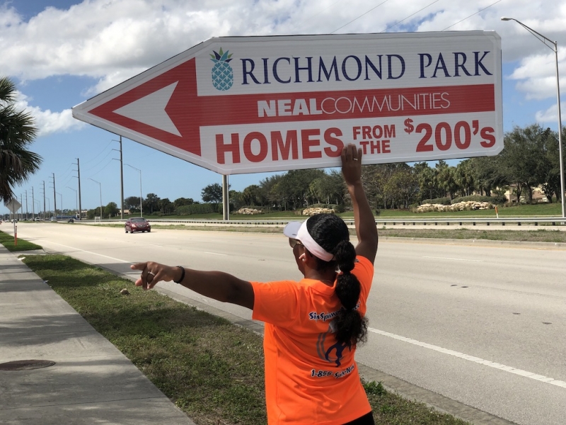 Sign spinner in action