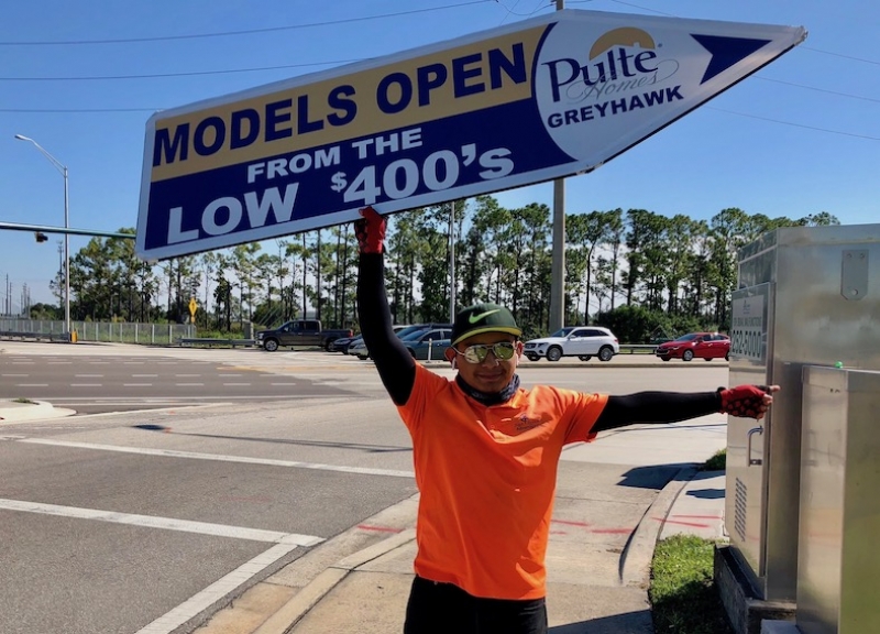 Sign spinner in action