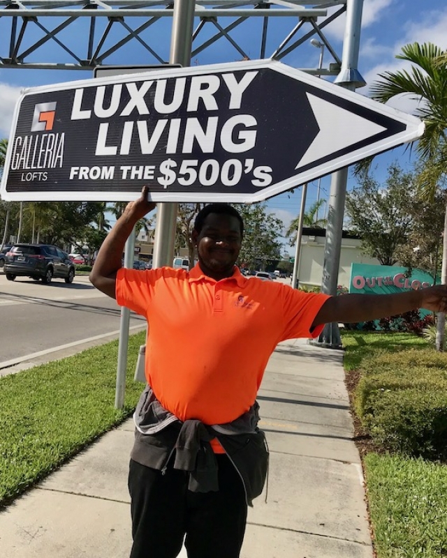 Sign spinner in action
