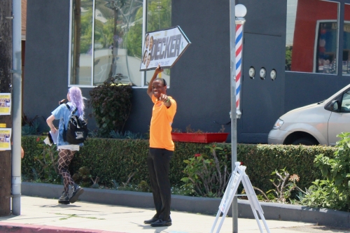 Sign spinner in action