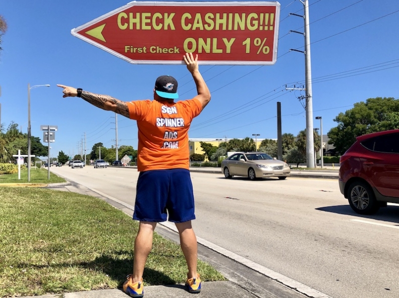 Sign spinner in action