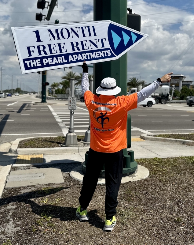 Sign spinner in action
