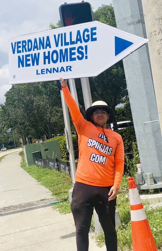 Sign spinner in action