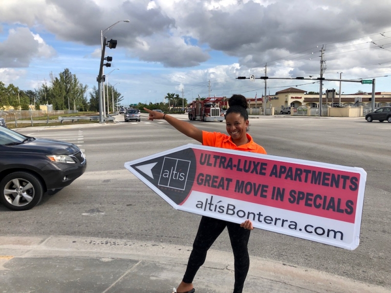 Sign spinner in action