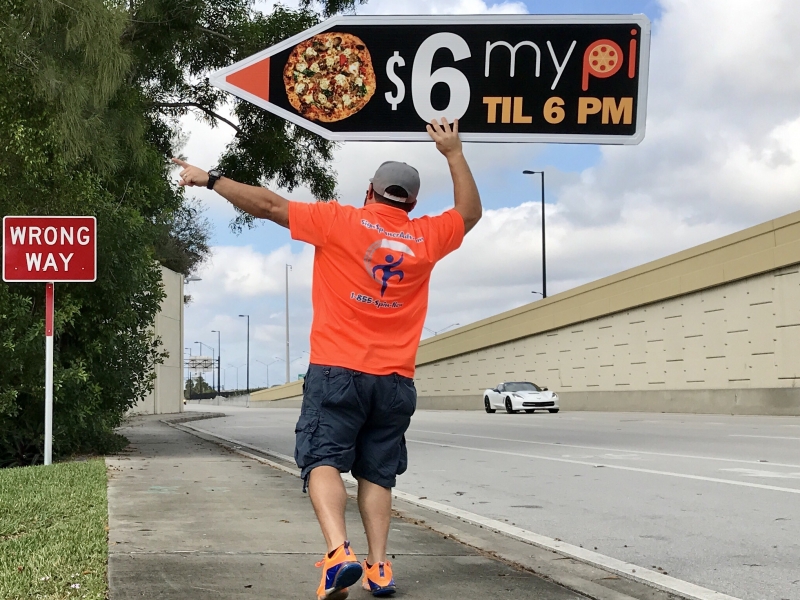 Sign spinner in action