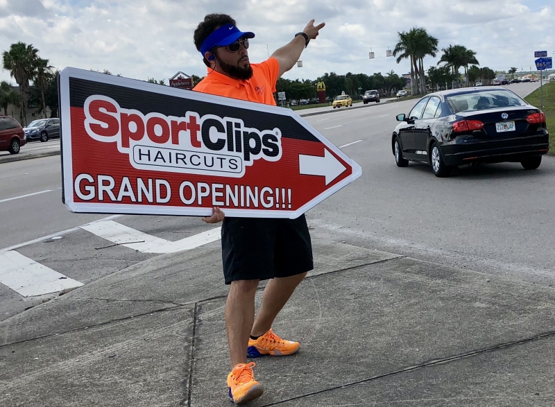 Sign spinner in action