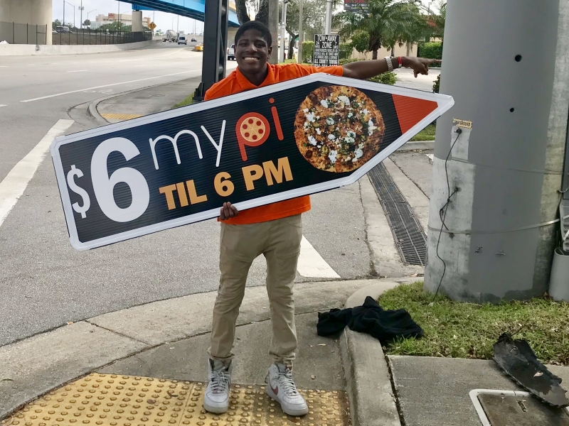Sign spinner in action
