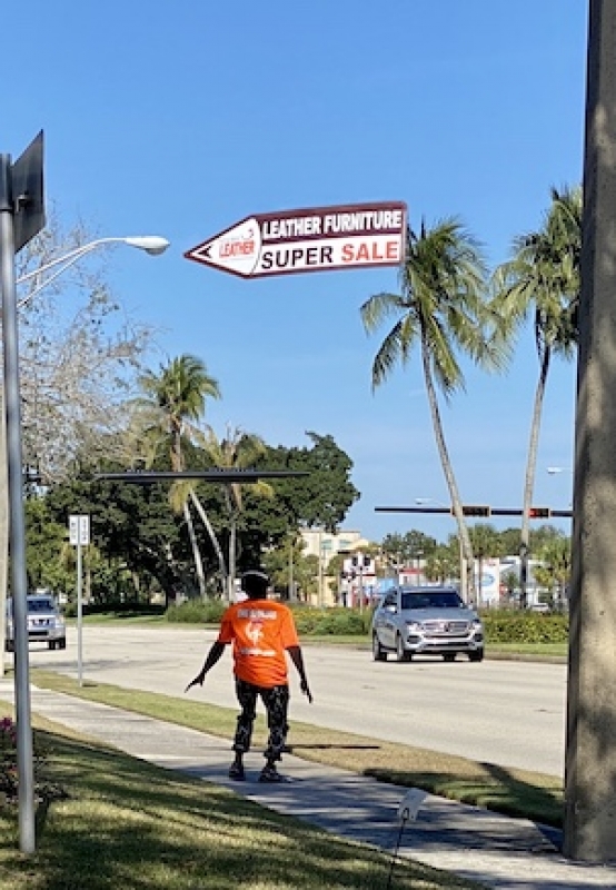 Sign spinner in action