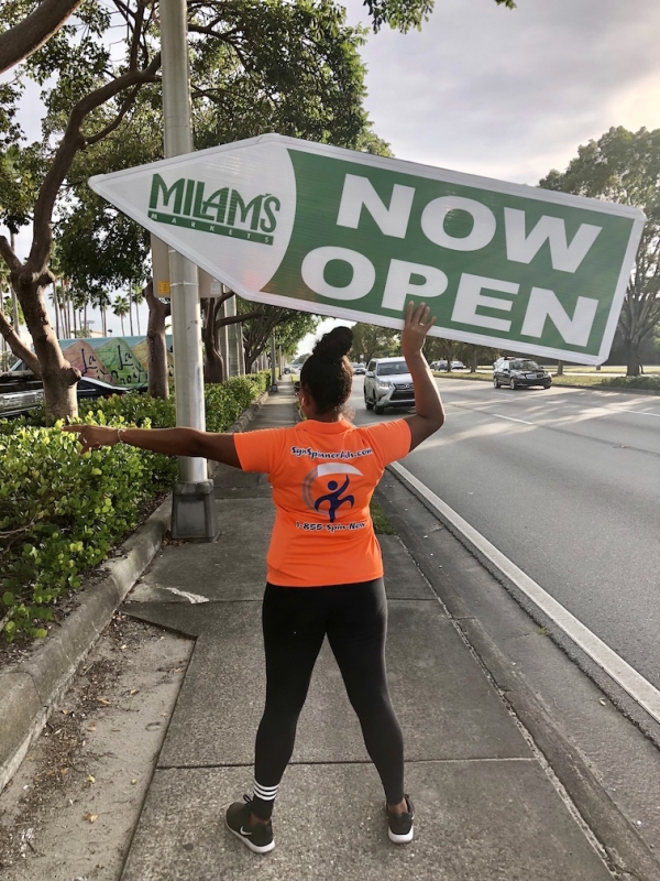 Sign spinner in action