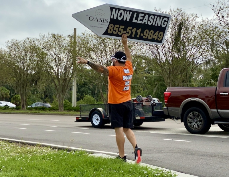Sign spinner in action