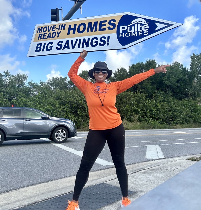 Sign spinner in action